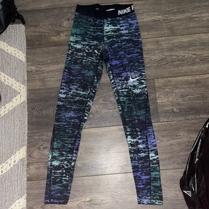 Cool colored Nike leggings. Very good for keeping warm on cold days.